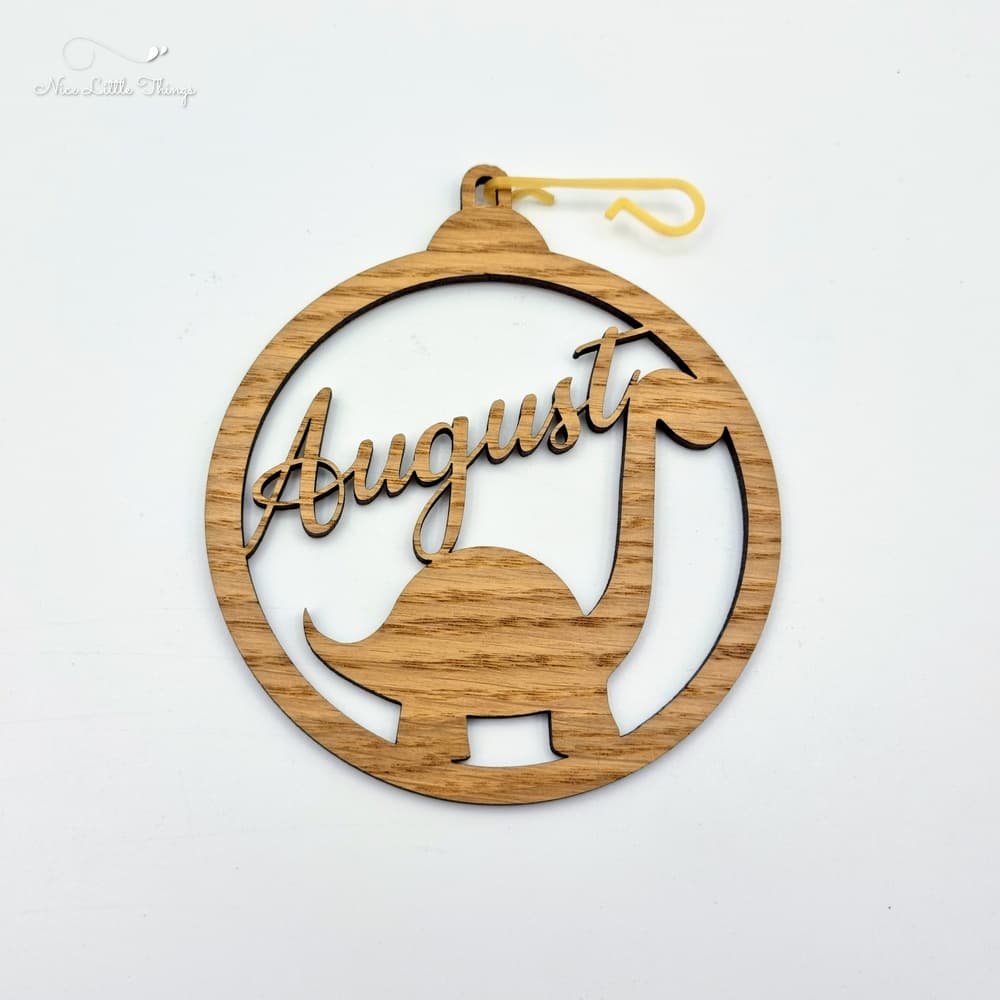 Boule de Noël Dino avec nom